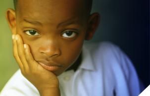 Image: Little Boy With Hand On Face