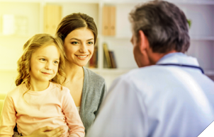 Image: Doctor Talking To Parent And Child